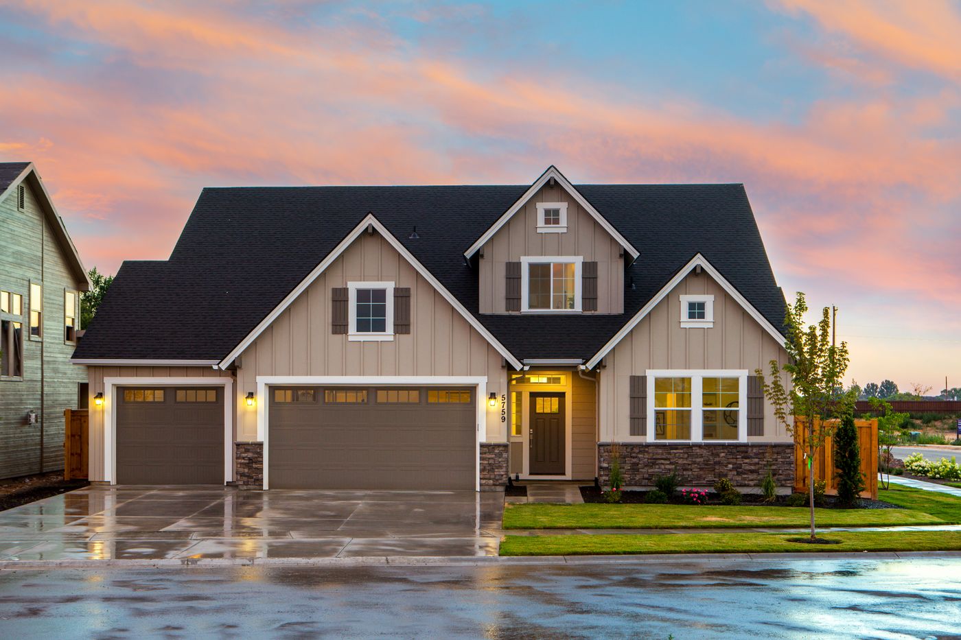 Craftsman-style Fort Wayne home at dusk